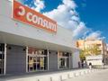 Строящееся торговое помещение, сданное в аренду супермаркету Consum, в Валенсии. Испания