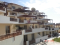 Апартаменты площадью 61 кв.м. с открытой  верандой площадью 8 кв.м. в пригороде  Пафоса. Кипр