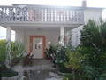 Дом, площадью 240+200 кв.м. (терраса и паркинг), с видом на море, в Доброте. Черногория